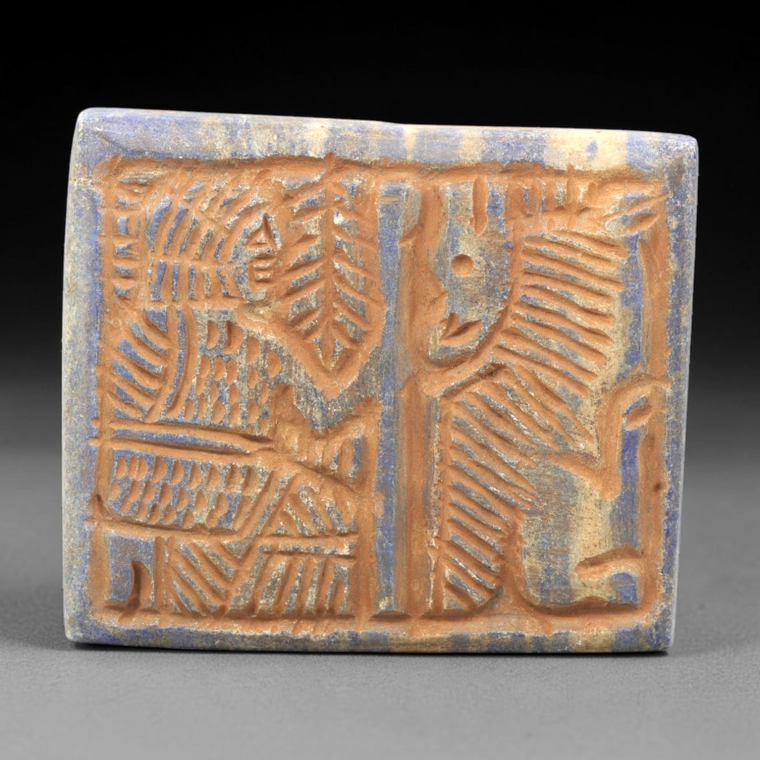 Near Eastern Lapis Lazuli Plaque - Tribal Art Figure & Feline Relief, 84ZY: Carved from natural lapis lazuli stone, this Near Eastern tribal art plaque relief features a hand-carved composition of a stylized human figure positioned alongside a feline motif, executed with inci