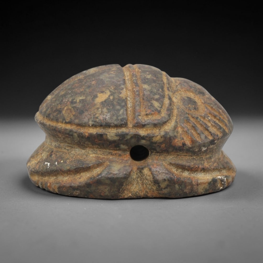 Ancient Hardstone Scarab - Large-Scale Egyptian Revival Amulet, 66AS: This artifact is hand-carved from a dense, mottled hardstone with earthy brown and green mineral inclusions, reflecting a robust, large-scale execution consistent with Egyptian Revival or late period
