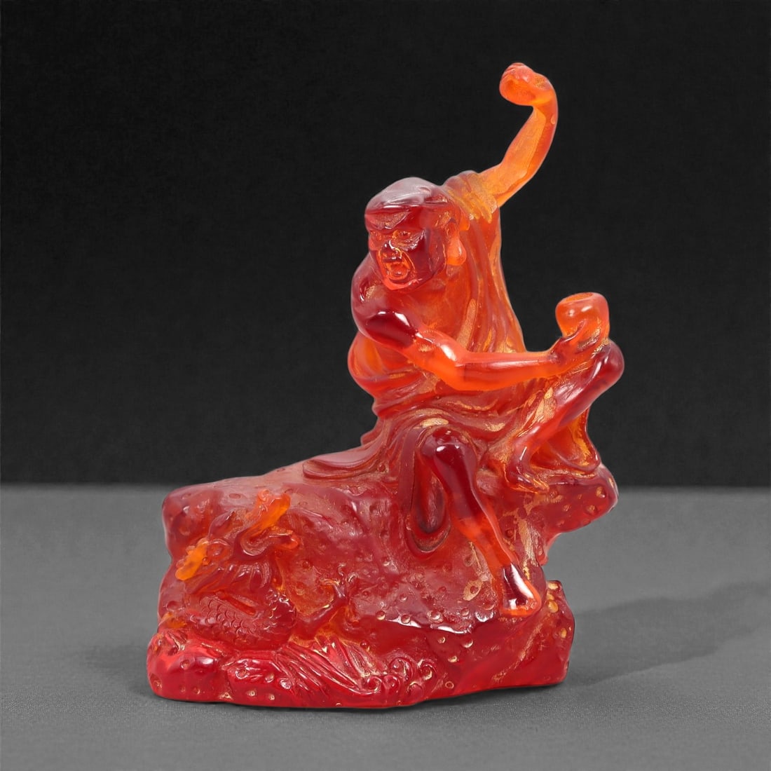 A Chinese Amber-Resin Figure of a Luohan, 20th Century, 34FH (1 of 2)