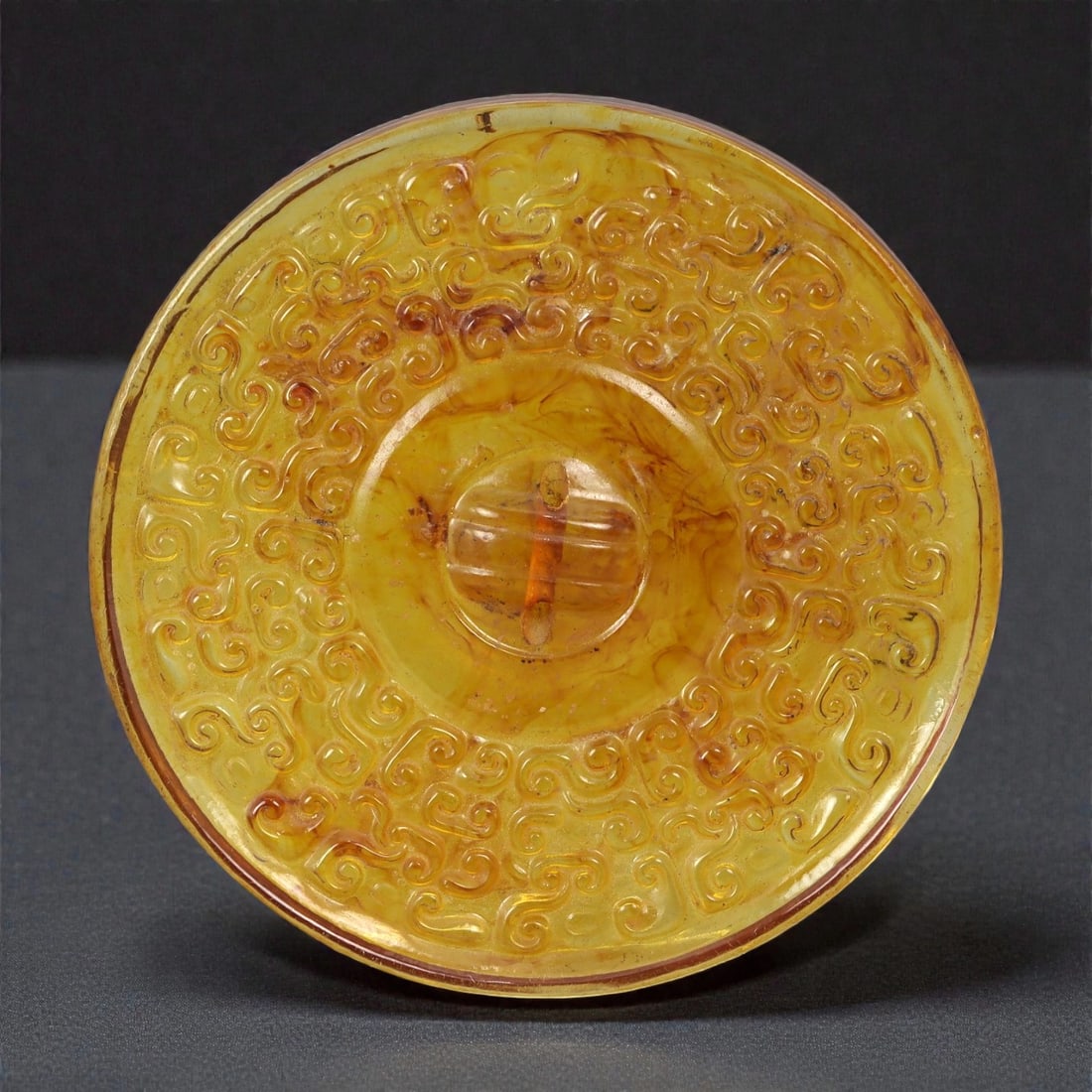 A Chinese Amber Resin Bi Disk, 20th Century, 56FC (1 of 2)