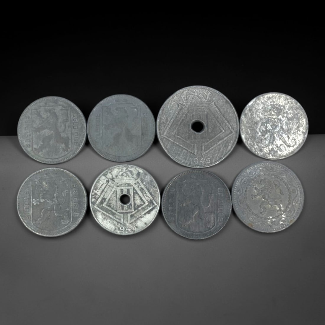 NETHERLANDS EAST INDIES / INDONESIA: 8-Piece Coins Set, 1940s-1950s, 20-26mm, 21ZJ: This 8-Piece Coins Set encapsulates the pivotal political and monetary transition of the Dutch East Indies to the Republic of Indonesia, spanning the 1940s and 1950s. Ranging from 20 to 26mm in diamet