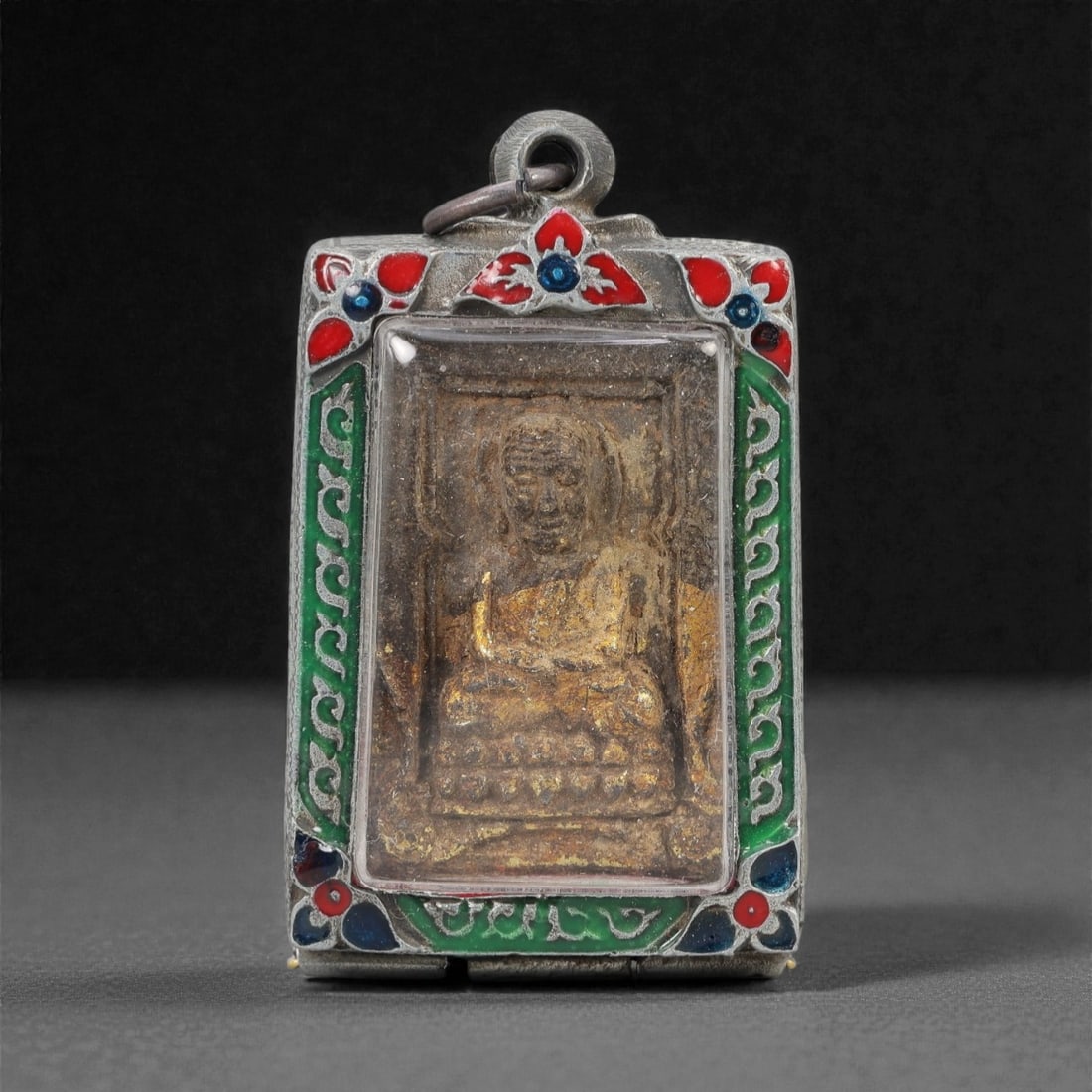 A Thai Gilded Clay Monk and Buddha Amulet in Enameled Metal Case, 20th Century, 40ZH (1 of 2)