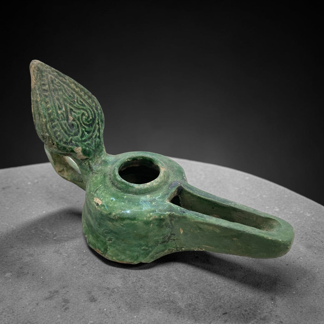Ancient Seljuk Green Glazed Pottery Oil Lamp, 170g, 86AA: This ancient oil lamp is a fine example of Seljuk-period ceramic craftsmanship, crafted from earthenware and covered in a vibrant, glossy green lead glaze with subtle age-related wear and minor glaze