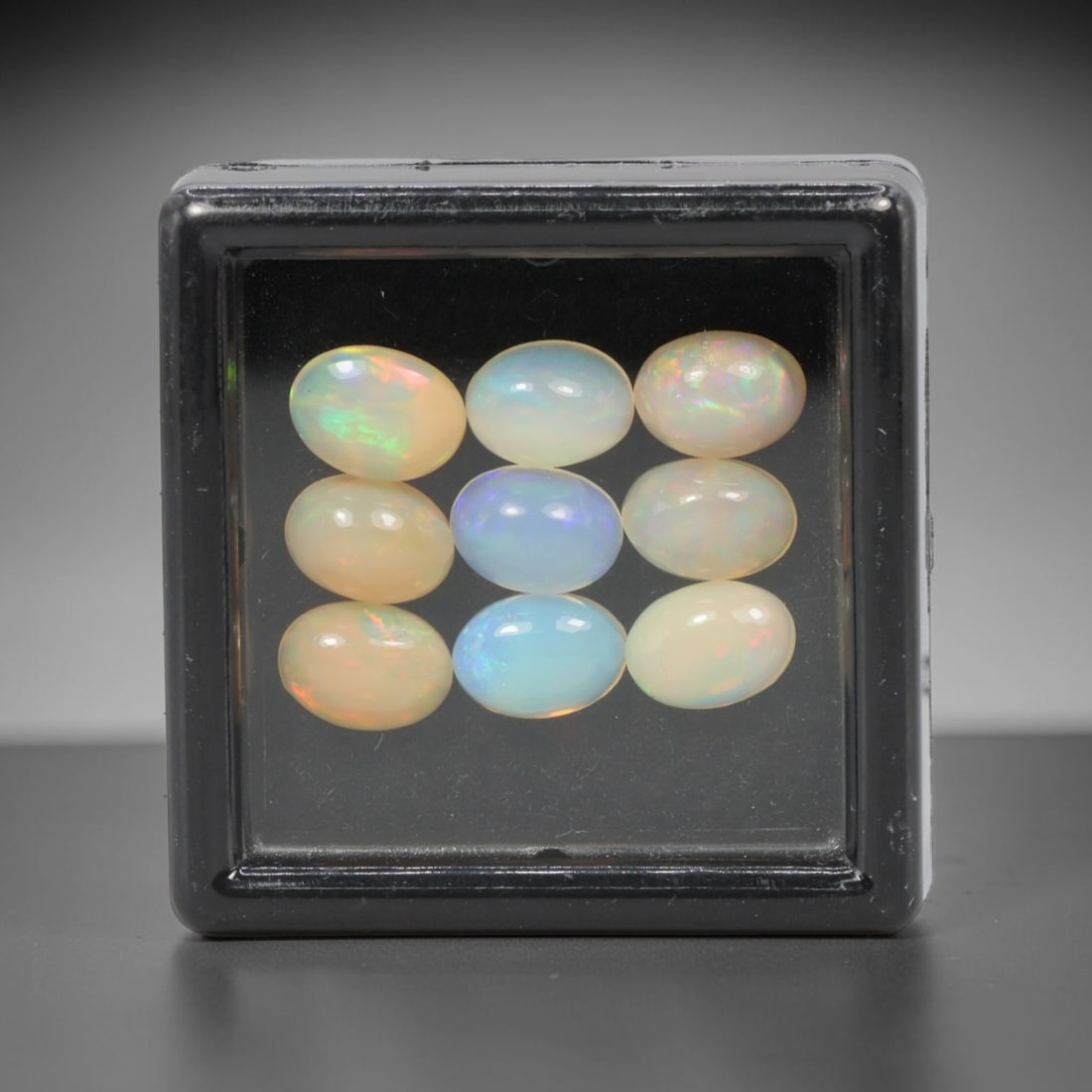 5.01 Carats Natural Ethiopian Welo Opal - Oval Cabochon Loose Gemstone Lot, 51WE: Natural oval cabochon Welo opal lot, sourced from the premium Welo deposit in Ethiopia. This curated collection features 12 exceptional opals with a stunning range of base tones-from icy sky blue, mil