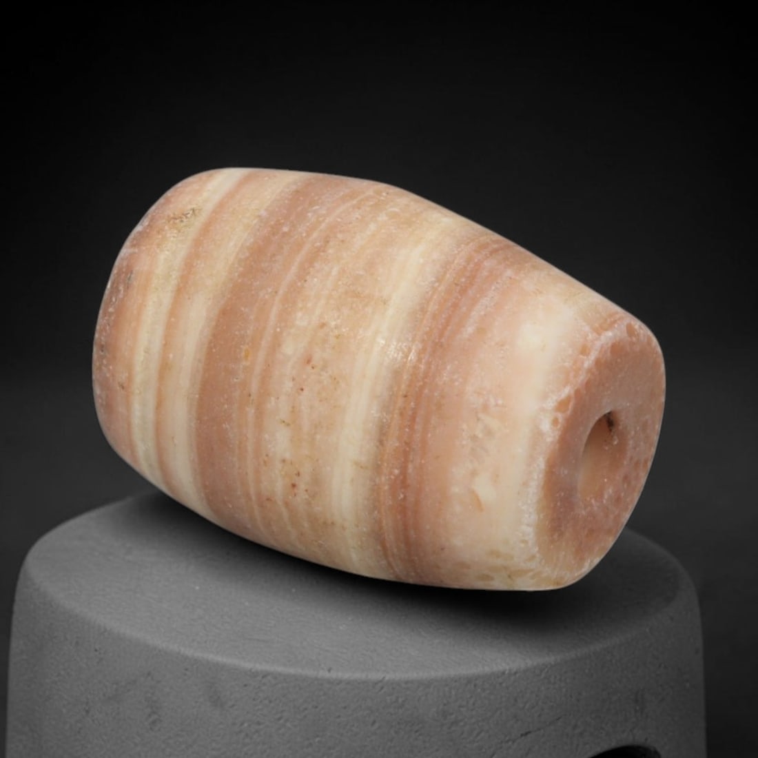Ancient Agate Bead - Indus Valley Bactrian Amulet, 69XT: This bead is carved from naturally banded agate, exhibiting fine lapidary craftsmanship consistent with ancient bead-making traditions of the Indus Valley and Bactrian regions. The barrel form feature