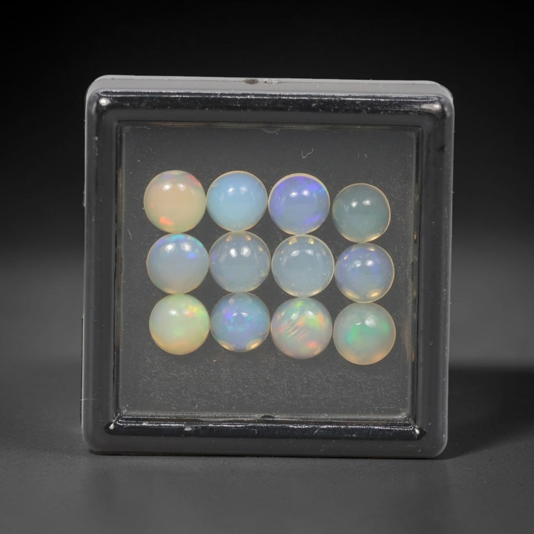 4.16 Carats Natural Ethiopian Welo Opal - Round Cabochon Loose Gemstone Lot, 39WE: Natural round cabochon Welo opal lot, sourced from the premium Welo deposit in Ethiopia. This curated collection features exceptional opals with a stunning range of base tones-from icy sky blue and mi