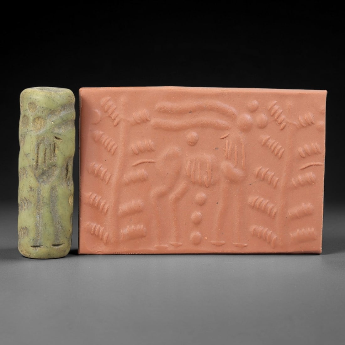 Ancient Serpentine Cylinder Seal - Mesopotamian, 68FX: Carved from serpentine, this cylinder seal follows the classic cylindrical form of ancient Mesopotamian administrative and ritual artifacts. Attributed to the Bronze Age Mesopotamian cultures, this se