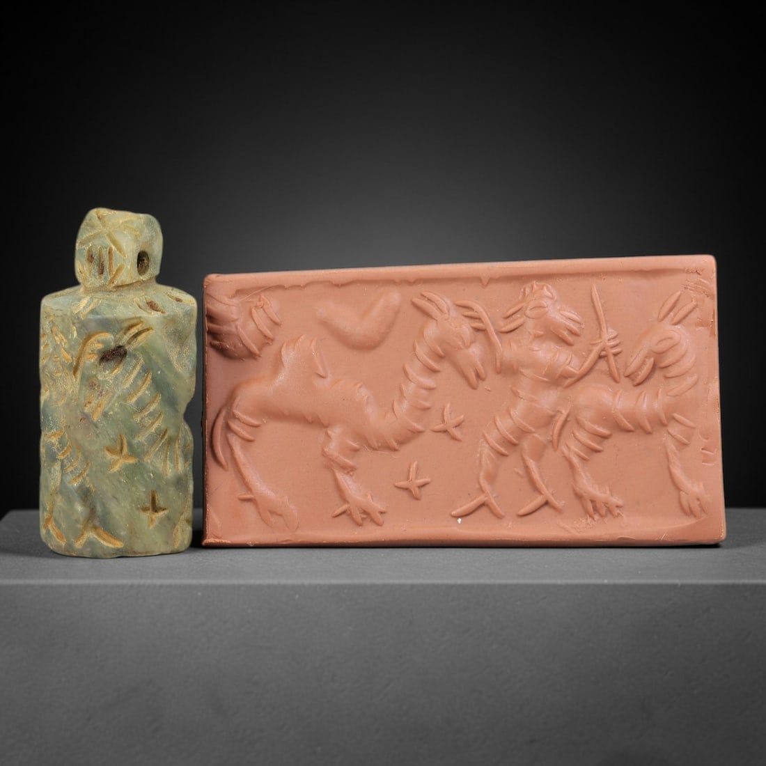 Ancient Serpentine Cylinder Seal - Mesopotamian, 76FX: Carved from serpentine, this cylinder seal follows the classic cylindrical form of ancient Mesopotamian administrative and ritual artifacts. Attributed to the Bronze Age Mesopotamian cultures, this se