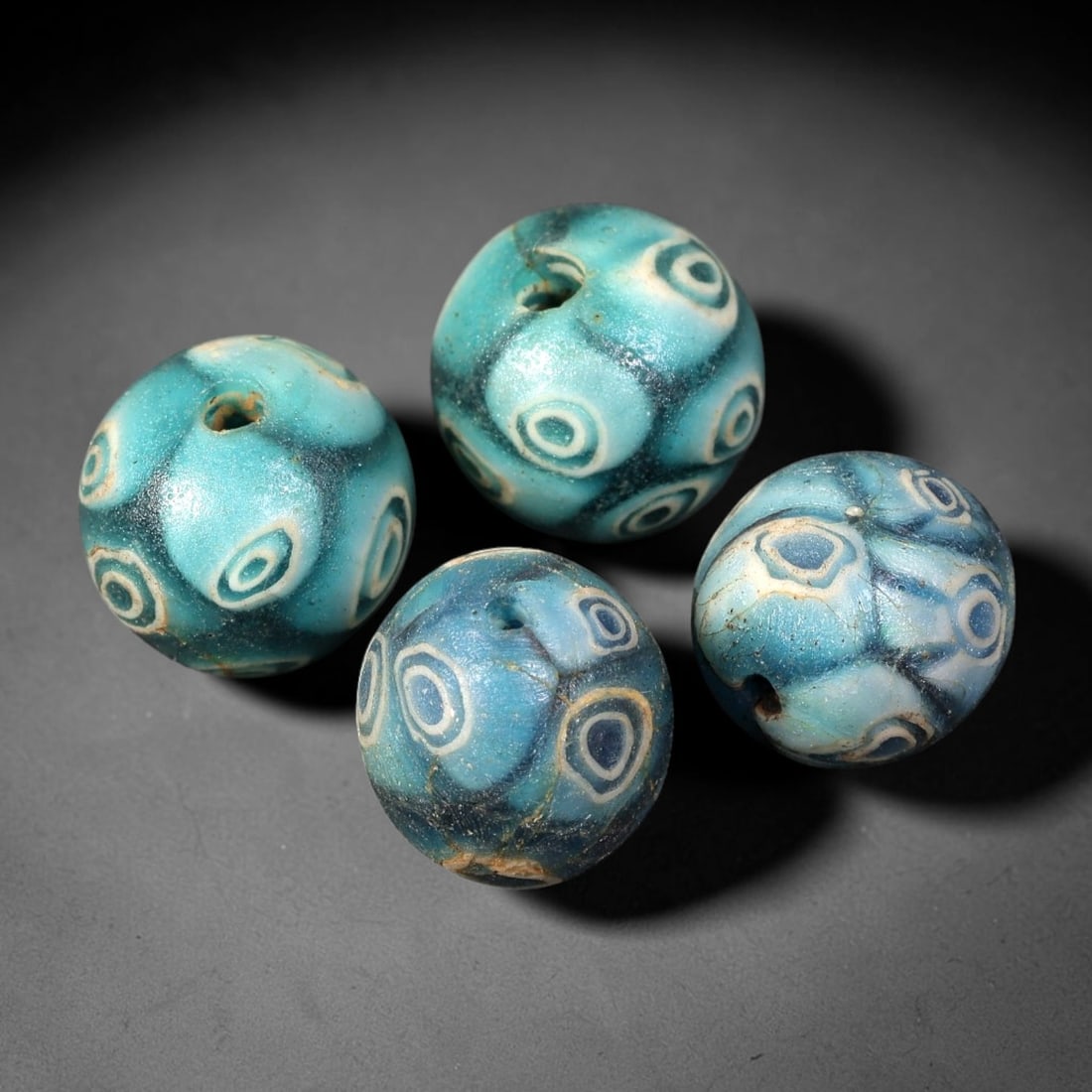 Old Glass Eye Beads - Phoenician Style Spherical Beads, 96BG: Set of four spherical old glass eye beads, crafted from layered colored glass with distinct concentric "eye" motifs across each surface. Each bead features raised multi-layered eyes with white, blue, 