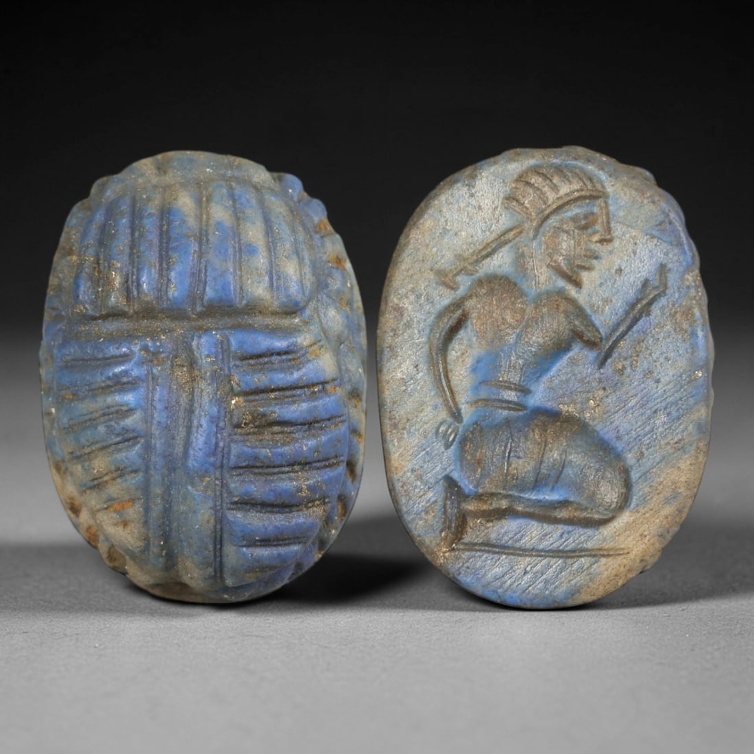 Ancient Lapis Lazuli Scarab - Near Eastern Figural Seal, 65AS: This artifact is hand-carved from lapis lazuli, employing traditional ancient lapidary techniques consistent with Near Eastern Bronze Age seal craftsmanship. The object takes the form of a scarab beet
