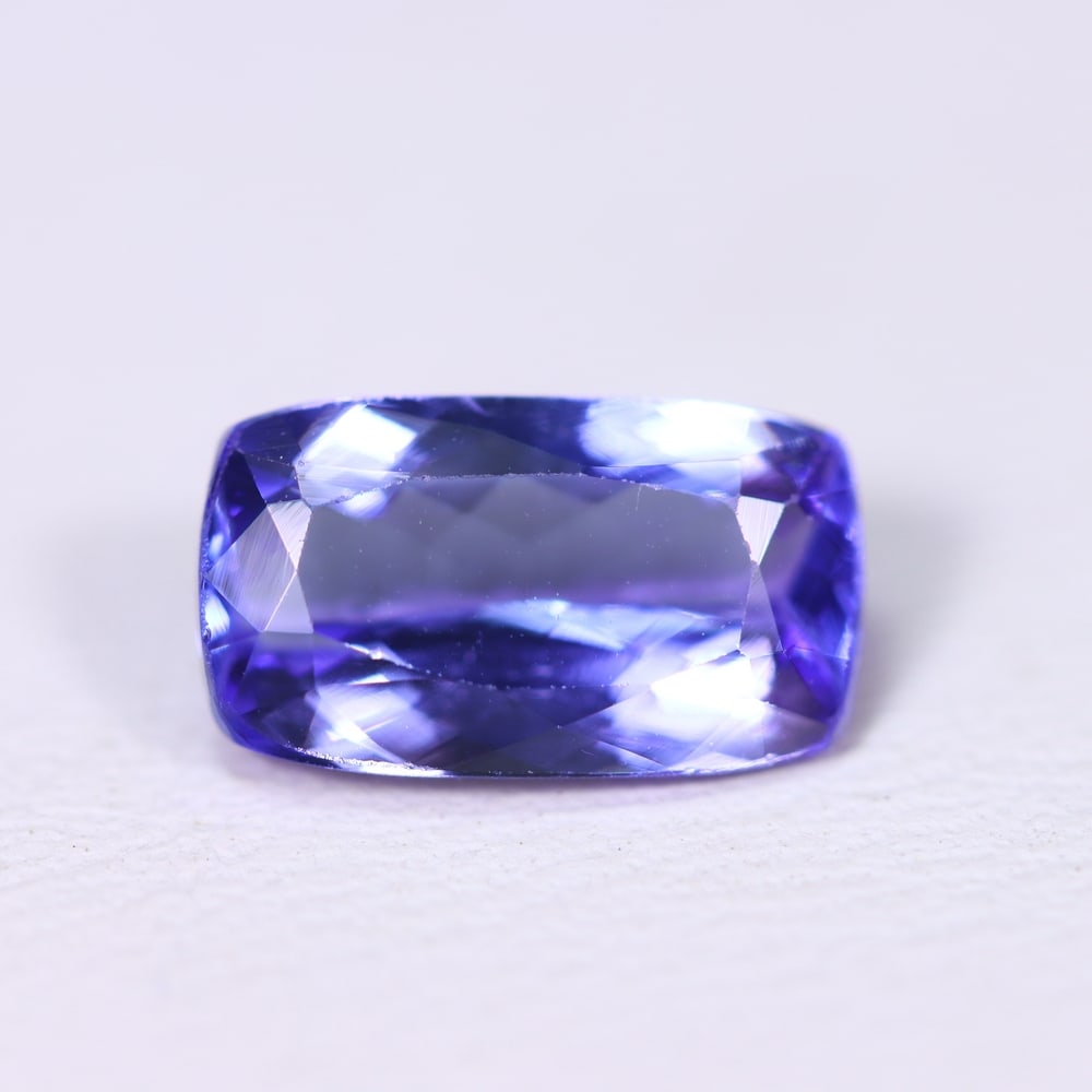 1.99Ct Tanzanite Faceted - Rectangle Polished , 167B: ThousandPlanet Auction Subject: Natural Tanzanite Origin: Tanzania Dimension: 9.9x5.7x3.8 mm Treatment: Heated Shape: Rectangle Type: Faceted, Polished