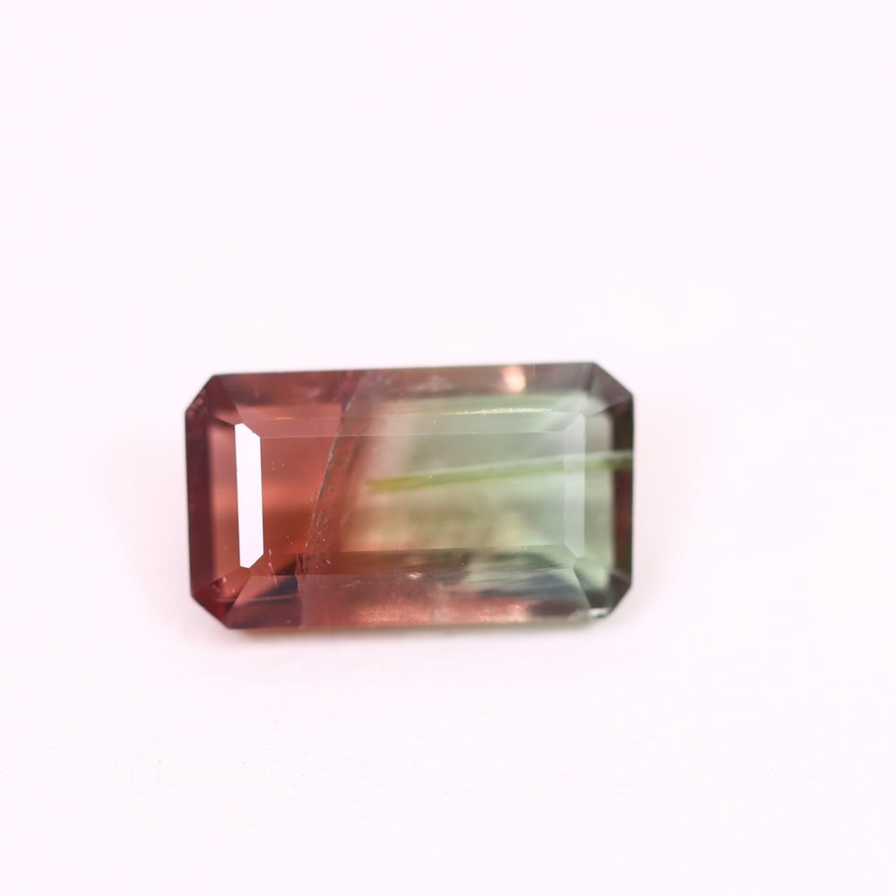 *2.39Ct Natural Watermelon Tourmaline - Bi-Colour Faceted Cut, 140C: ThousandPlanet Auction Subject: Natural Tourmaline Origin: Africa Carat Weight: 2.39 Ct Dimension: 10.8x6.2x3.9 mm Type: Faceted, Polished