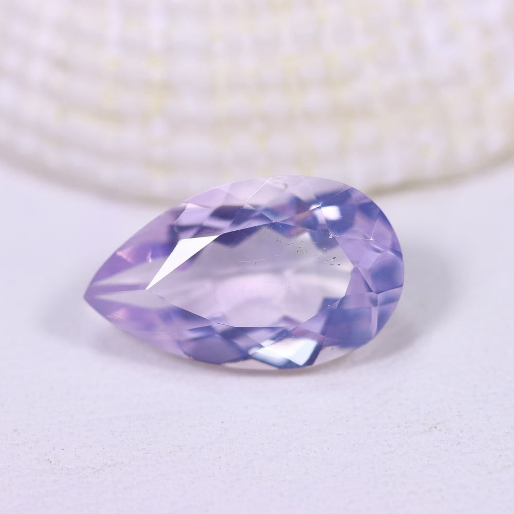 3.02Ct Lavender Amethyst - Polished Faceted , 765E: ThousandPlanet Auction Subject: Natural Lavender Amethyst Origin: Brazil Carat Weight: 3.02Ct Dimension: 13.1x7.9x5.3 mm Treatment: Untreated Type: Faceted, Polished