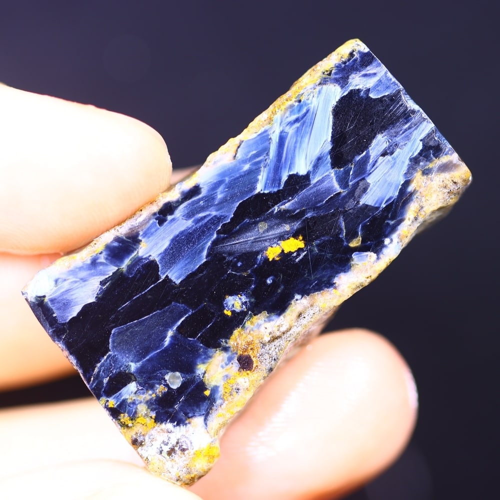 40.92Ct Pietersite Slab - Gemstone Crystal - Freeform Slice, 345B: ThousandPlanet Auction Subject: Natural Pietersite Origin: Namibia, South Africa Carat Weight: 40.92Ct Dimension: 35.2 x 21.2 x 5.6 mm Treatment: Natural Untreated Shape: Freef
