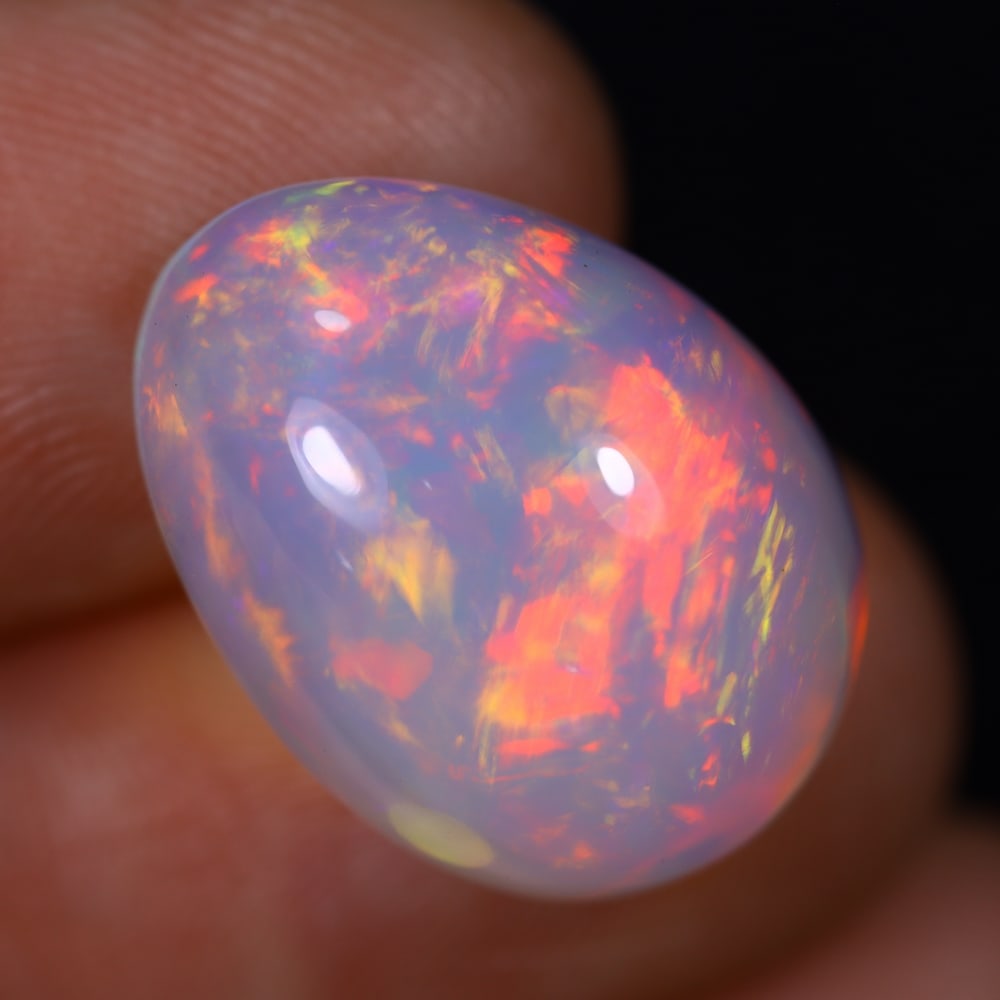 *12.12Ct Welo Opal Polished - Ethiopian Opal , 277E: ThousandPlanet Auction Subject: Natural Ethiopian Welo Opal Origin: Ethiopia Carat Weight: 12.12Ct Dimension: 18.5x13.7x9.2 mm Treatment: Natural Untreated Type: Cabochon,