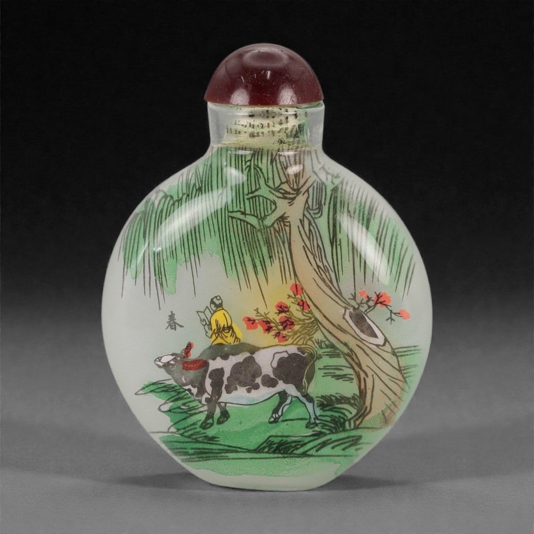 A Chinese Inside-Painted Glass Snuff Bottle, 20th Century, 4FG: The bottle is formed from clear glass and decorated with an interior painting executed on the inner surface of the vessel. It is of flattened circular form with a short cylindrical neck, fitted with a