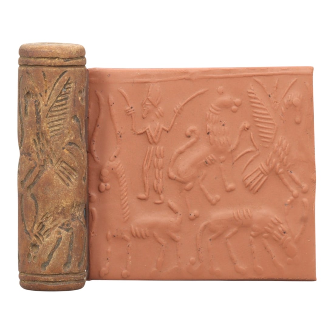 Ancient Steatite Cylinder Seal - Mesopotamian Mythological Combat Scene, 93ZR: Carved from dense steatite, this ancient Mesopotamian cylinder seal presents a detailed mythological combat scene in linear relief, featuring a human figure with weapons alongside winged and quadruped