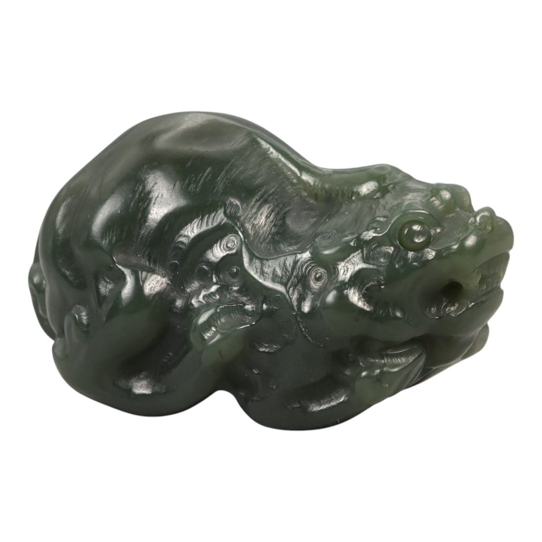 Chinese Dark Green Jade Pi Xiu - Guardian Beast Figurine, 88ZD: Carved from dense, dark green jade with a high-polish finish, this compact sculptural figure depicts a pi xiu in a powerful crouching posture. The mythical creature is rendered with a pronounced drago