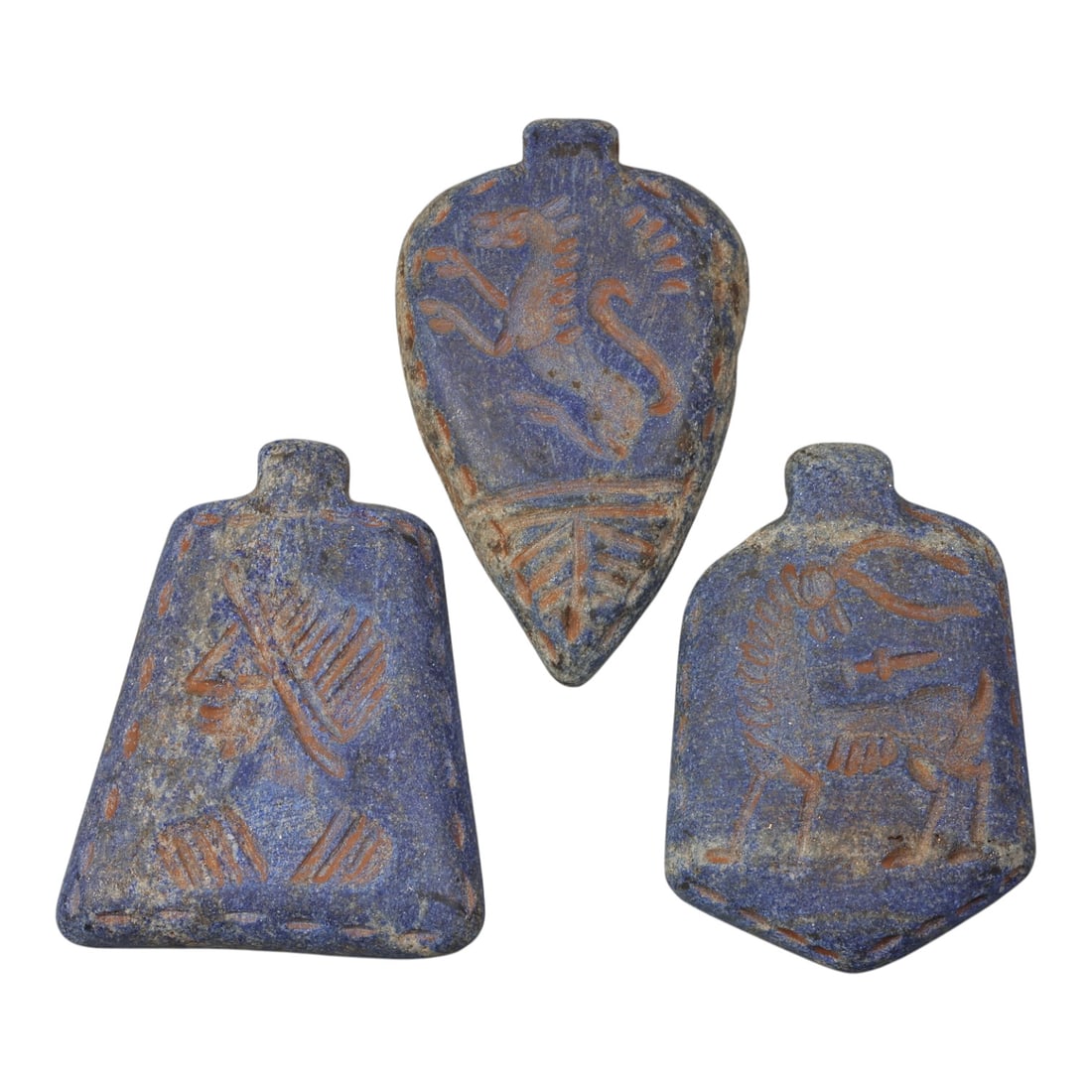 Lot of 3 Ancient Near Eastern Lapis Lazuli Amulets, 54WP: A collection of three hand-carved lapis lazuli amulets, attributed to ancient Near Eastern cultures (likely Mesopotamian or related traditions). Each pendant features a deep blue lapis lazuli base wit