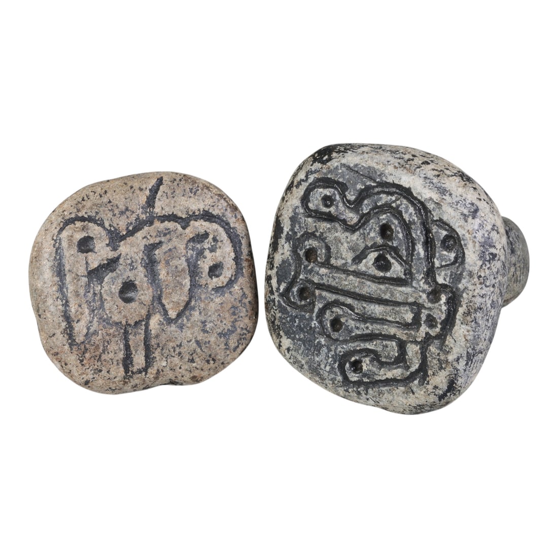 Lot of 2 Ancient Near Eastern Schist Stamp Seals, 53WP: A pair of ancient Near Eastern stamp seals, carved from weathered schist stone. Each seal features a rounded, knobbed handle with a drilled hole for suspension, and a square/rounded base incised with 