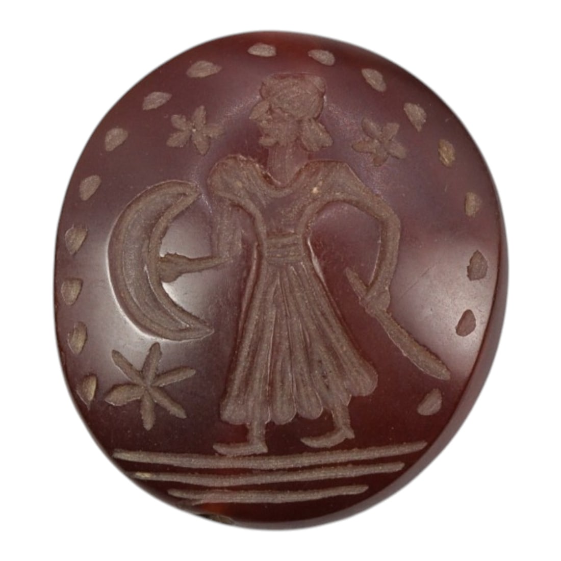 Ancient Near Eastern Carnelian Intaglio Seal, 81WM: A single ancient Near Eastern-style carnelian intaglio seal, carved with a standing figure holding a crescent moon and a sword, surrounded by star and floral motifs. The figure is depicted in traditio