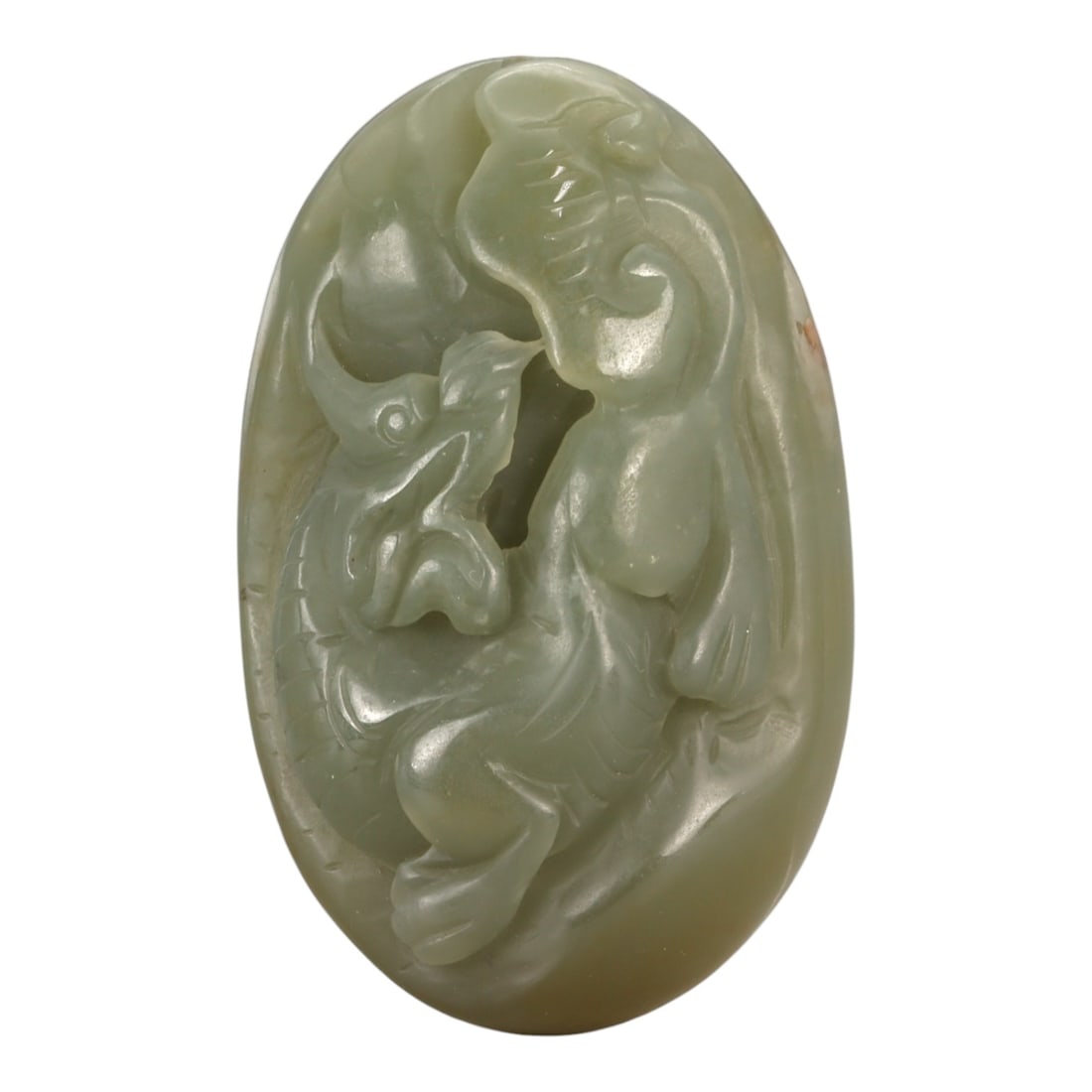 A Chinese Jade Fruit and Flower Plaque, 20th Century, 43YA: Carved from pale celadon jade with soft translucency and minor natural inclusions, the object is formed as an oval plaque carved in relief. The composition depicts a fruiting plant with a rounded frui