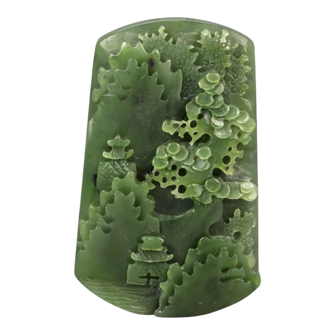 A Chinese Nephrite Jade Landscape Plaque, 20th Century, 46FA: Carved from green nephrite jade with darker inclusions and natural mottling, the plaque is worked in relief on one side to depict a stylized landscape composition. The surface is carved with overlappi