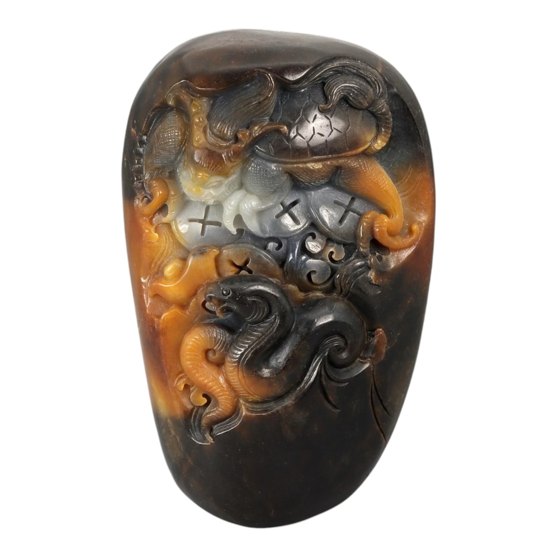 A Chinese Nephrite Jade Carving, 20th Century, 29FD: Carved from a single block of nephrite jade of Hetian type, the stone exhibits natural tonal variation ranging from dark grey to brown and amber hues, with areas of lighter translucency. The carving i