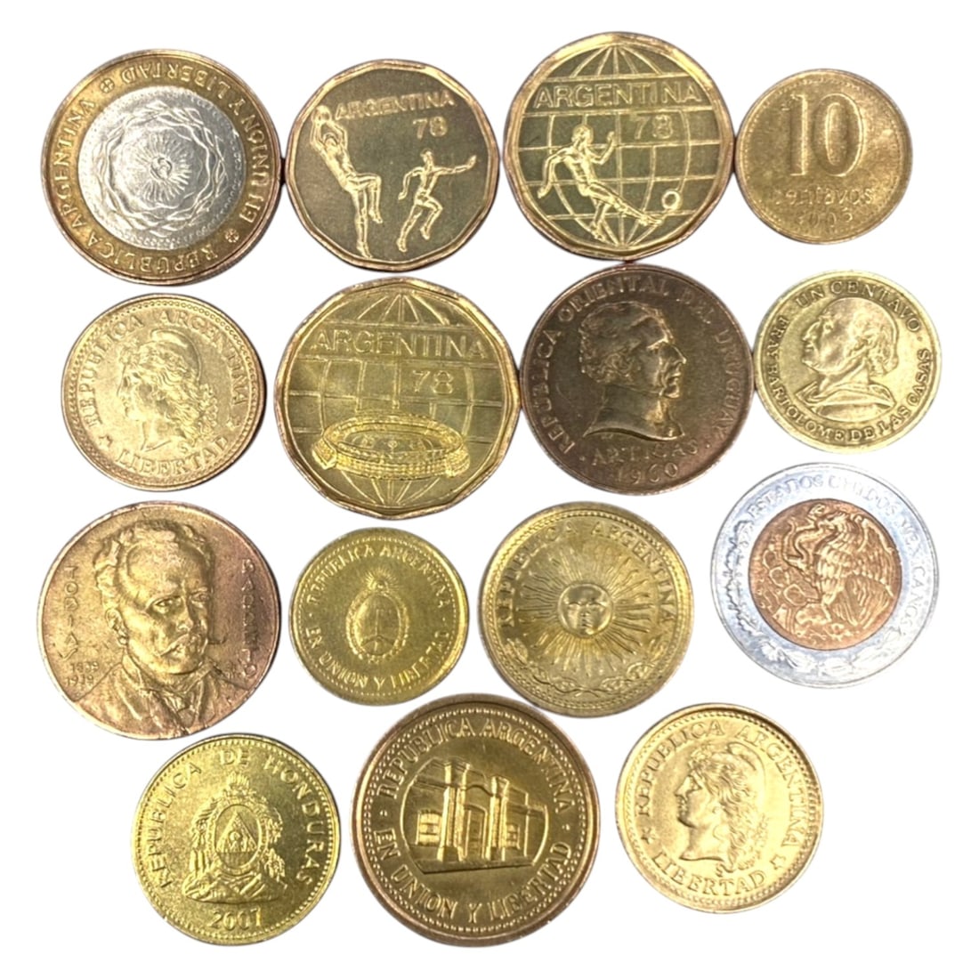 LATIN AMERICA: National Identity & Sporting Legacy - 15-Piece Coins Set, 1939-2015, 18-25mm, 9ZJ: This curated 15-Piece Coins Set spans over seven decades of Latin American numismatic history, featuring coins from Argentina, Brazil, Guatemala, Honduras, and other nations, ranging from 18 to 25mm i