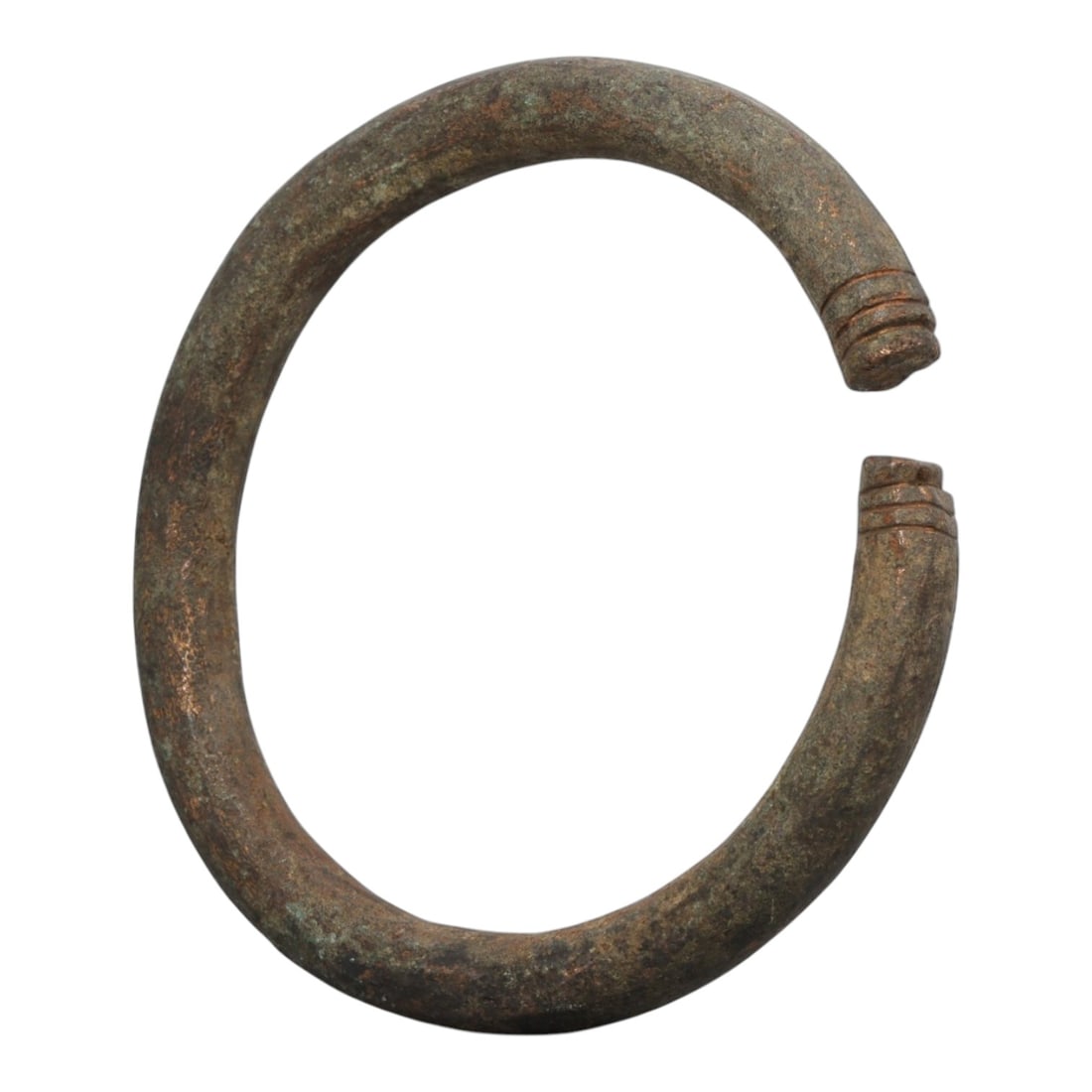 Ancient Bronze Bracelet - Roman Decorated Penannular Bangle, 88BN: A penannular bronze bracelet of ancient Roman origin, formed from a thick, rounded bronze band. The open terminals are adorned with raised collars, a simple decorative motif common in Roman provincial