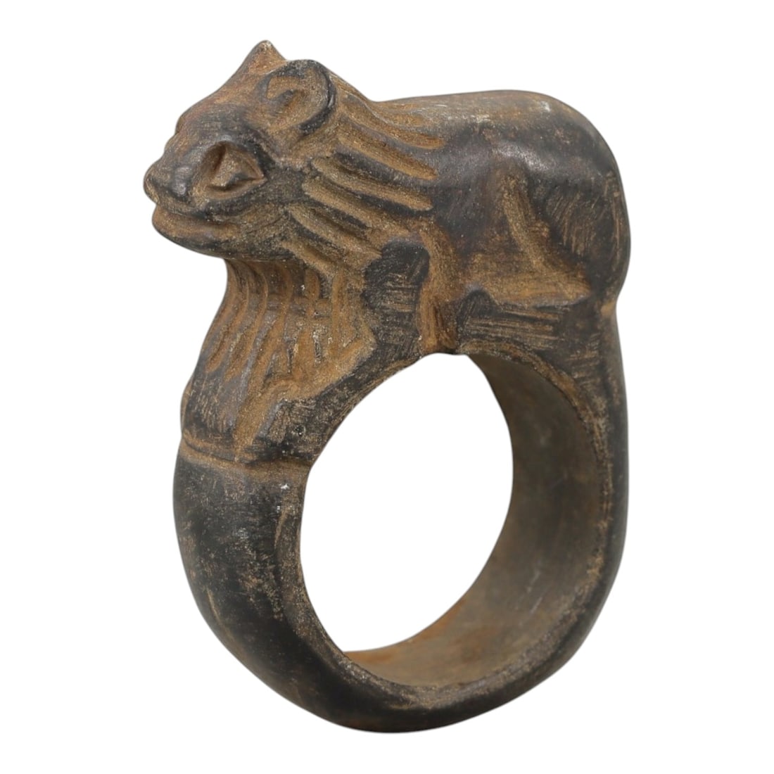 Ancient Steatite Achaemenid Ring - Zoomorphic Carving, 32AH: Crafted from steatite stone, this ancient Achaemenid ring features a zoomorphic lion-head motif with incised detailing, characteristic of Achaemenid glyptic art. The stone exhibits a natural, earthy p