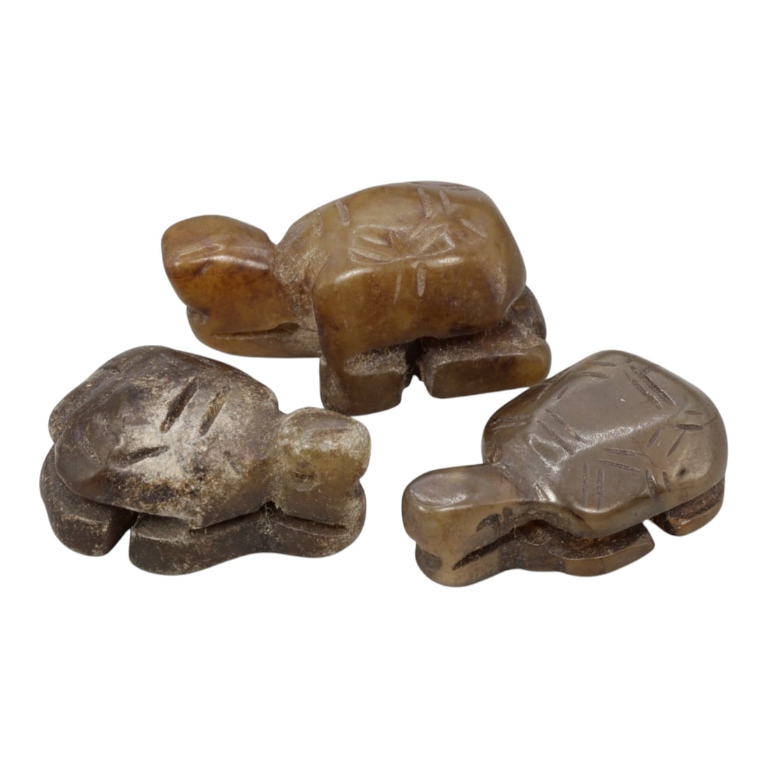 Lot of 3 Antique Chinese Qing Dynasty Jade Tortoise Carvings, 15WM: A group of three hand-carved jade tortoise figures, typical of Qing Dynasty jade craftsmanship. The tortoises are rendered in recumbent poses with stylized incised lines representing the shell pattern