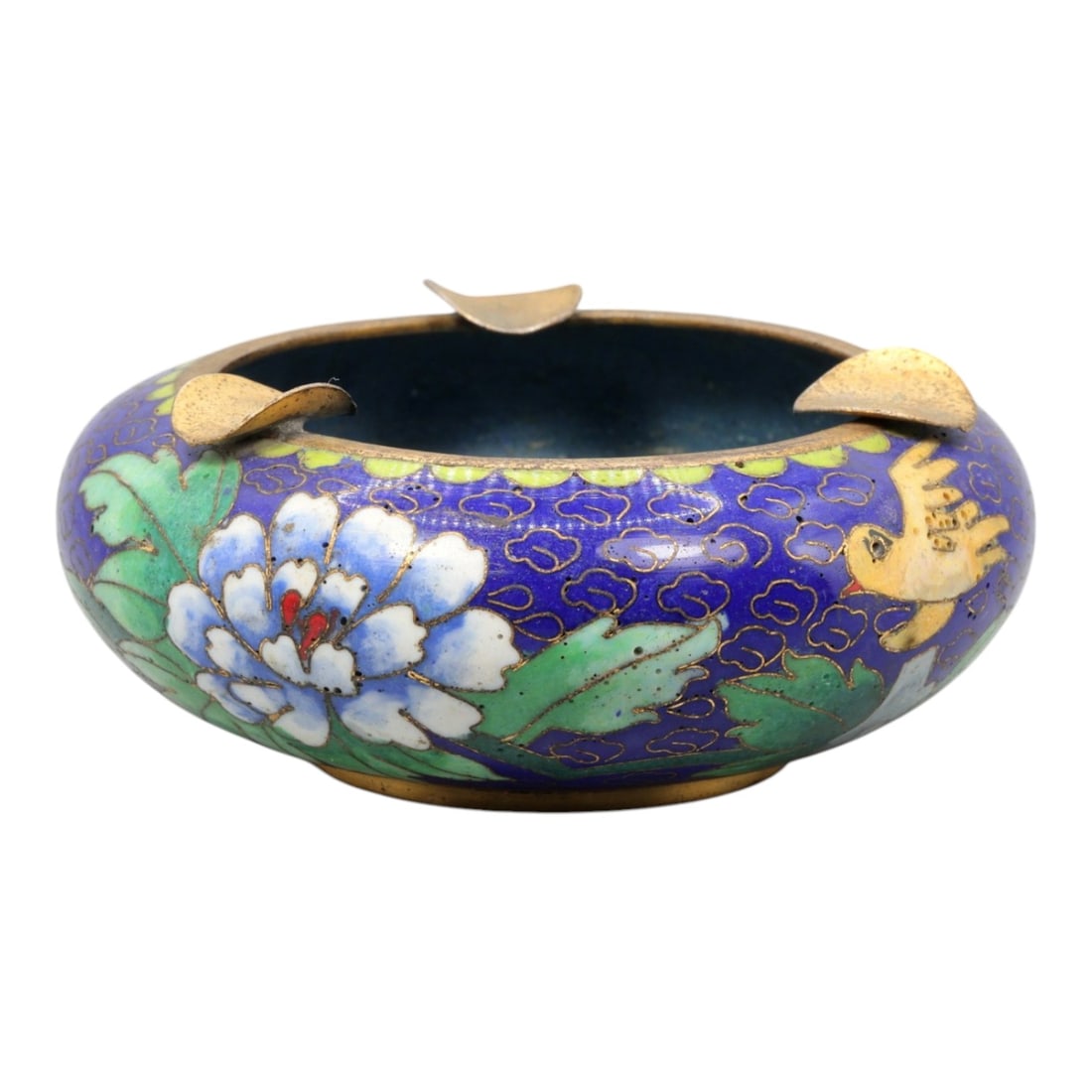 A Chinese Cloisonne Enamel Ashtray, 20th Century, 88YC: Constructed in copper and decorated with polychrome cloisonne enamel, the ashtray is formed with a shallow circular body and a slightly recessed interior, supported on a narrow foot ring. The rim is f
