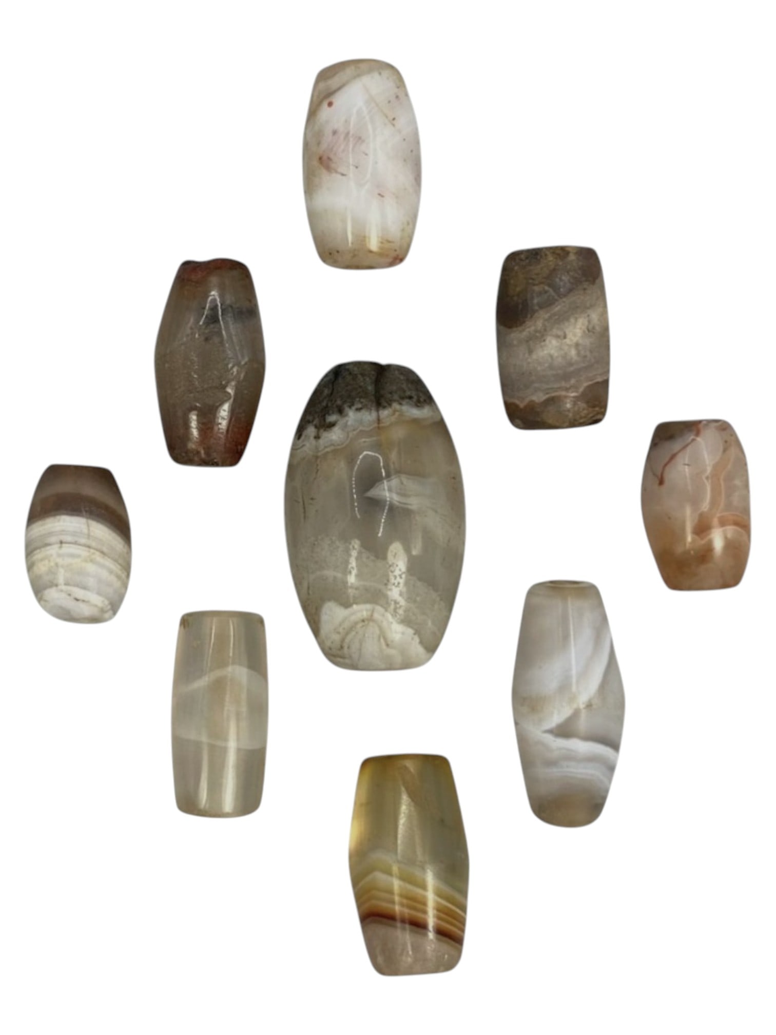 Lot of 9 Himalayan Banded Agate Beads, Ancient to Antique Period, 48WT: A group of nine beads crafted from banded agate, showcasing natural tones including translucent white, grey, amber, and subtle reddish hues, with characteristic concentric, wavy, and linear banding pa