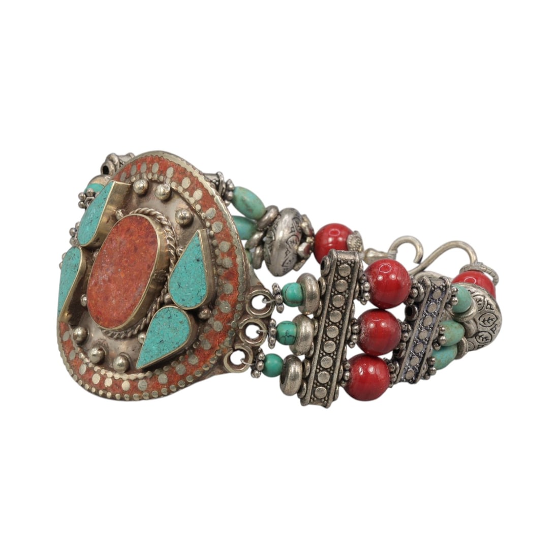 Lot of 1 Vintage Himalayan Silver-Plated Multi-Stone Inlay Bracelet, 29AH: A handcrafted vintage bracelet, measuring approximately 6 cm in width, showcasing traditional Himalayan jewelry design. The piece features a silver-plated metal base with a large central oval red cora