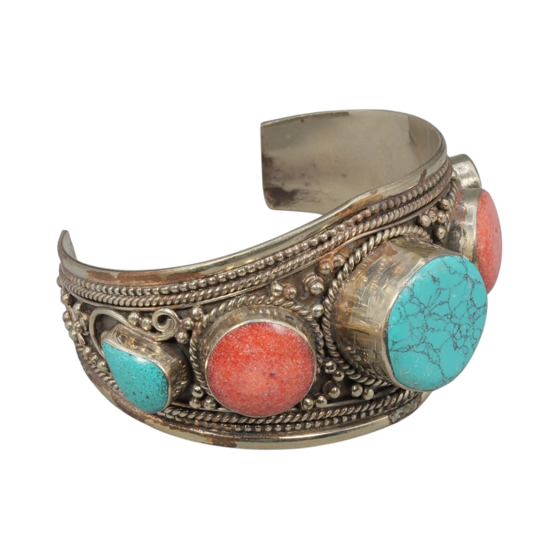 A Vintage Himalayan Silver-Plated Multi-Stone Cuff Bracelet, 27AH: A handcrafted vintage cuff bracelet, measuring approximately 7 cm in width, showcasing traditional Himalayan jewelry design. The piece features a silver-plated metal base, with alternating round and c