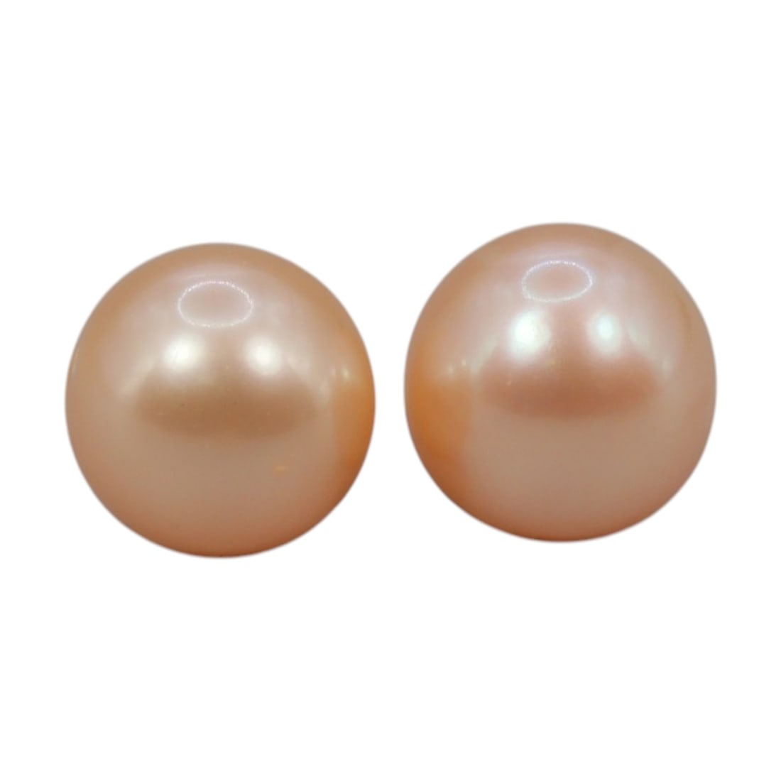 Freshwater Pearl Pair - Natural Pearl Peach Round Gemstones 7.3mm, 24XA: A matched pair of natural freshwater pearls, exhibiting a soft peach-gold hue with bright, uniform luster and subtle iridescent orient. The pearls are near-spherical, with smooth nacre and only minor 
