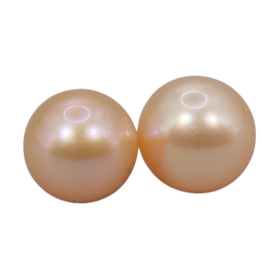 Freshwater Pearl Pair - Natural Pearl Peach Round Gemstones 7.4mm, 22XA: A matched pair of natural freshwater pearls, exhibiting a soft peach-gold hue with bright, uniform luster and subtle iridescent orient. The pearls are near-spherical, with smooth nacre and only minor 