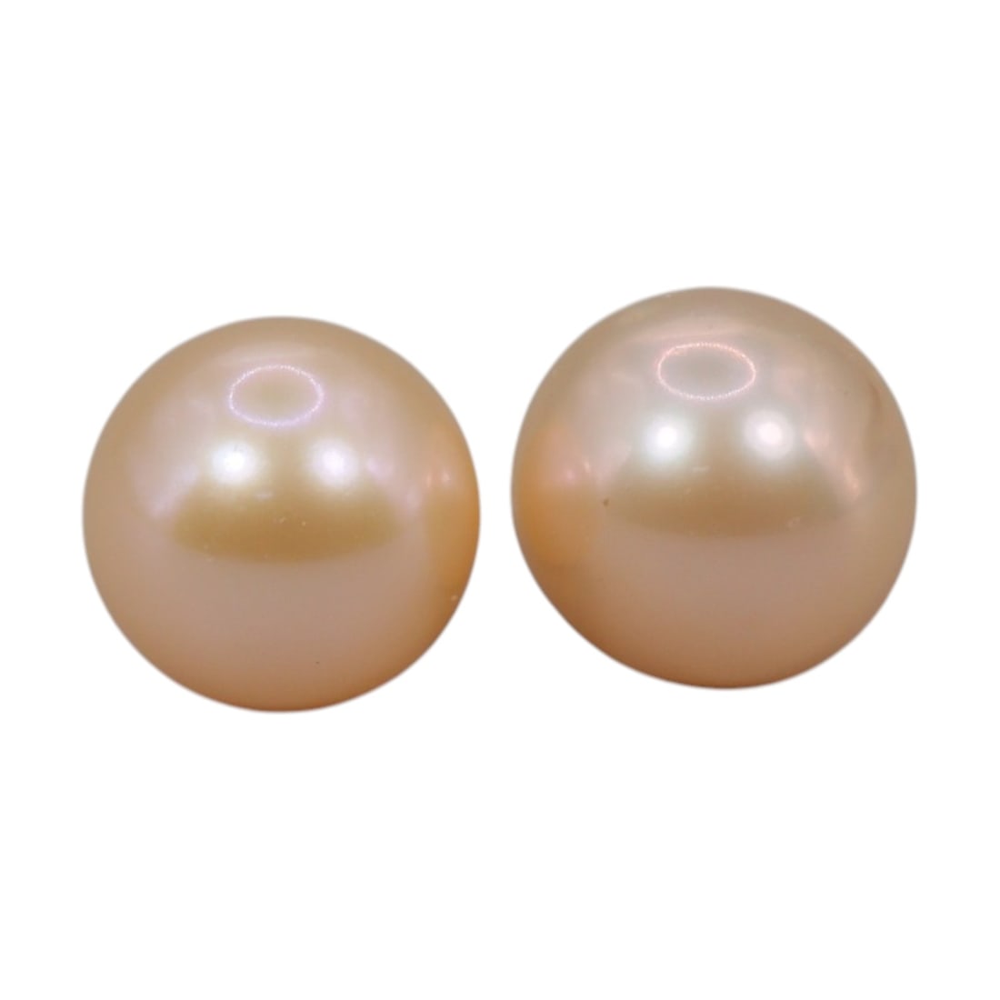 Freshwater Pearl Pair - Natural Pearl Peach Round Gemstones 7.9mm, 42XA: A matched pair of natural freshwater pearls, exhibiting a soft peach-gold hue with bright, uniform luster and subtle iridescent orient. The pearls are near-spherical, with smooth nacre and only minor 