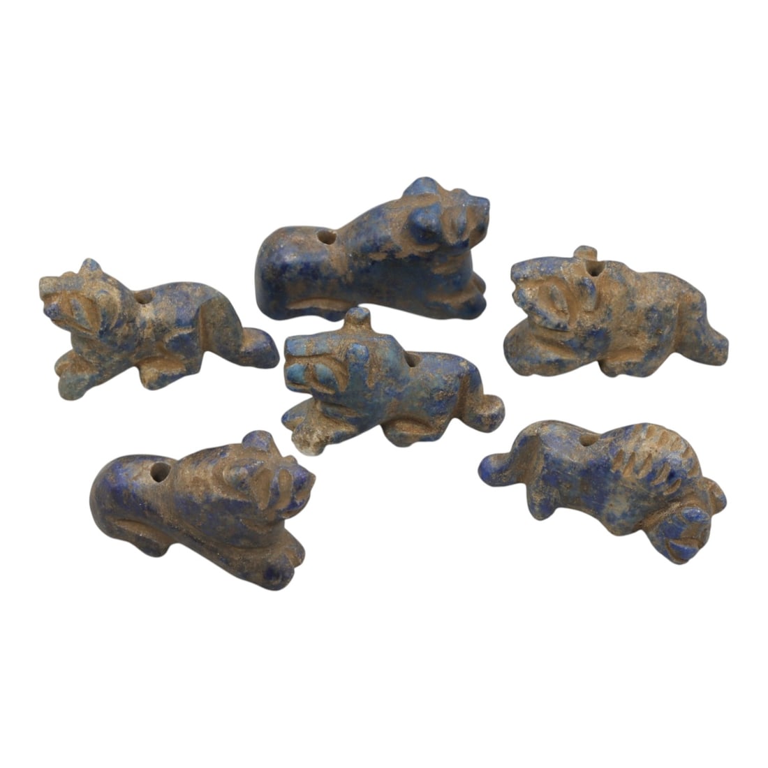 Lot of 6 Ancient Bactrian Zoomorphic Lapis Lazuli Amulets, Circa 3rd-2nd Millennium BCE, 53WT: Carved from lapis lazuli, exhibiting characteristic deep blue tones with natural mineral inclusions, the group consists of six stylized zoomorphic amulets. Each piece is rendered in a reclining or dyn