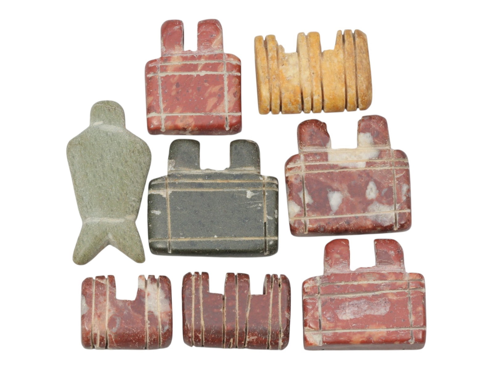 Lot of 8 Ancient Coptic Egyptian Multi-Stone Amulets, Circa Roman to Coptic Era, 64WT: Carved from various stones including red marble, green stone, dark stone, and yellowish stone, the group consists of eight distinct amulets, ranging in size from 2 cm to 3.5 cm (0.79-1.38 in.). The se