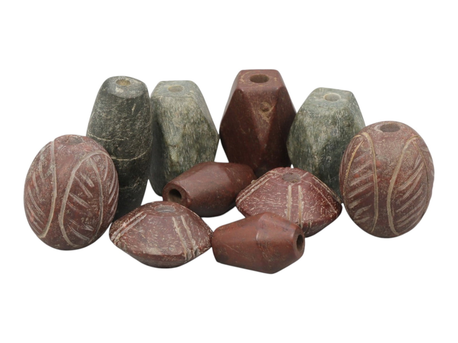 Lot of 10 Antique Medieval Stone Beads, 6WS: A collection of ten hand-carved stone beads, ranging in size from 2 cm to 3 cm (0.79-1.18 in.). The beads are made from various materials, including reddish-brown and greenish serpentine stone, with d