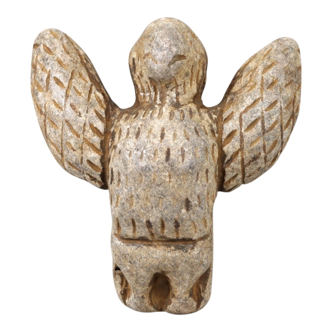 Ancient Stone Vulture Amulet - Near Eastern Avian Figure, 56AM: This vulture amulet is carved from light speckled stone, depicting a stylized vulture with outstretched wings and a compact, rounded body. The piece features incised linear and stippled detailing to d