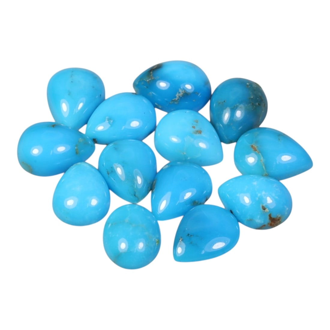12.26 Carats Natural Turquoise - Pear Cabochon Gemstone, 7XB: Pear cabochon-cut turquoise gemstone, crafted from natural turquoise material. The stone displays a vibrant sky-blue to turquoise hue, with natural matrix inclusions and subtle veining characteristic 
