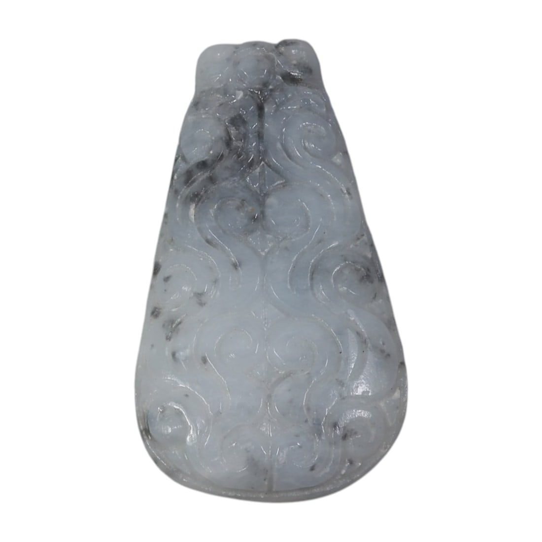 A Vintage Oriental Chinese Jadeite Jade Carved Pendant, 21AG: Carved from pale greyish-white jadeite jade with natural dark inclusions and marbling, the pendant is of teardrop form with raised relief scrollwork carved symmetrically across its surface. The design