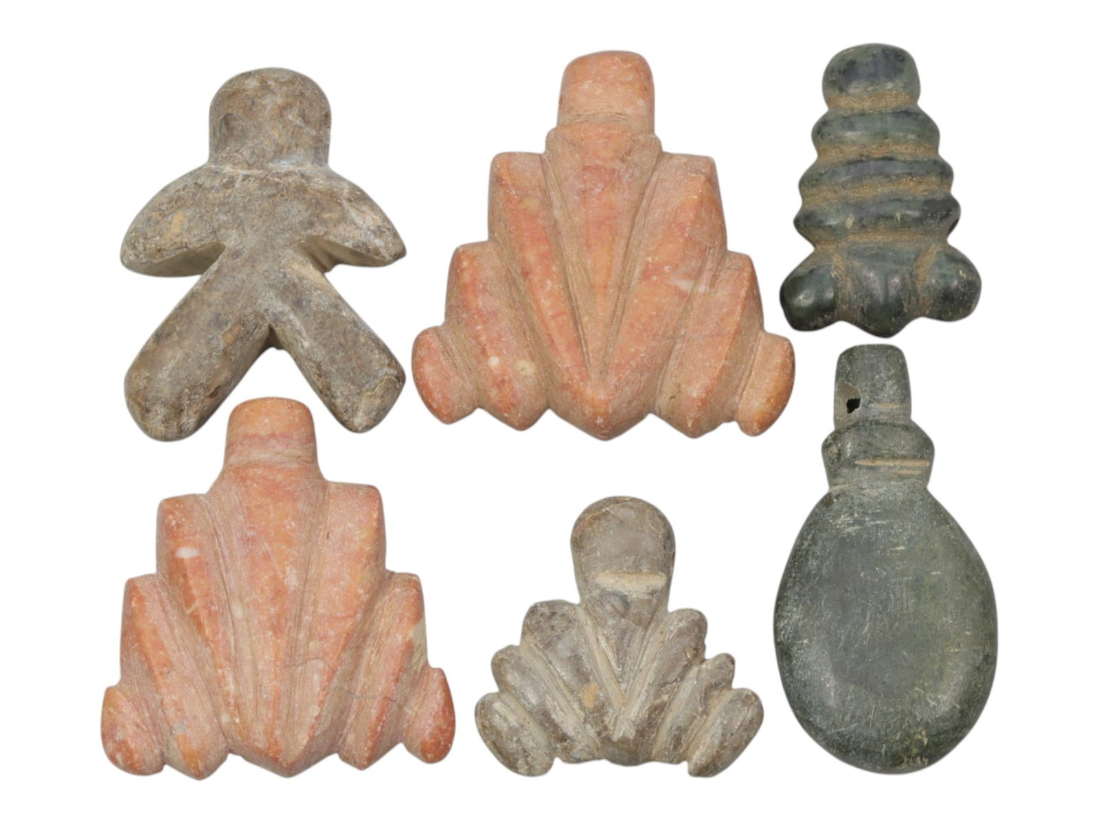 Lot of 6 Ancient Coptic Egyptian Multi-Stone Amulets, Circa Roman to Coptic Era, 71WT: Carved from a variety of stones in earthy tones-including light brown, pinkish-orange, and dark green-the group consists of six distinct amulets, ranging in size from 2 cm to 3 cm (0.79-1.18 in.). The