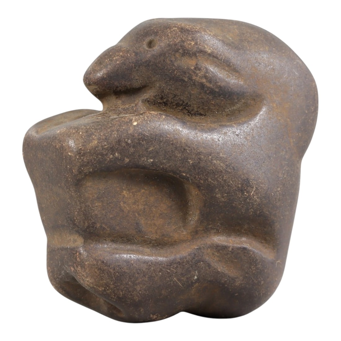 Ancient Stone Zoomorphic Effigy - Near Eastern Figurine, 5FY: Carved from a dense, smooth stone, this effigy depicts a stylized crouching animal-likely a rodent or small mammal-in a compact, rounded form. Relief details define the snout, circular eye socket, and