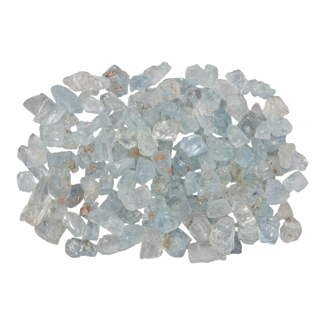 128.98 Carats Natural Aquamarine Rough Parcel, 42XE: This luminous parcel of natural aquamarine rough showcases the classic soft sky-blue hue the gem is known for, ranging from pale, translucent tones to deeper, more saturated blues. The stones are in t