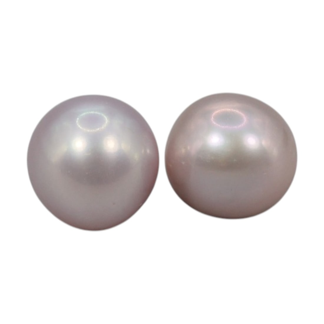 Freshwater Pearl Pair - Natural Pearl Lavender Round Gemstones 7.6mm, 18XA: A matched pair of natural freshwater pearls, exhibiting a soft lavender-pink body tone with bright, uniform luster and subtle iridescent orient. The pearls are near-spherical, with smooth nacre and on