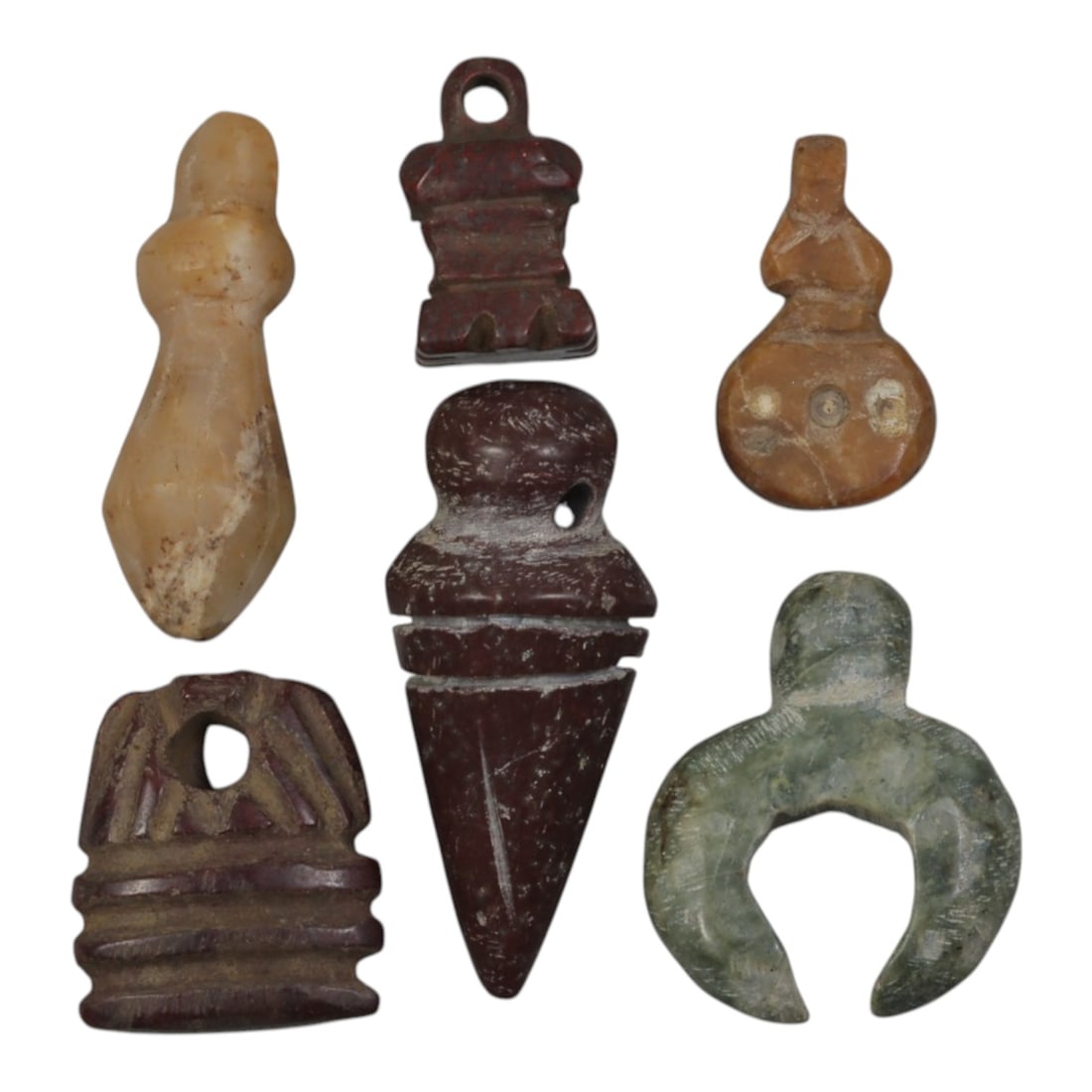 Lot of 6 Ancient Coptic Egyptian Stone Amulets, Circa Roman to Coptic Era, 79WT: Carved from various stones, including light beige, reddish-brown, tan, and green varieties, the group consists of six distinct amulets. The set includes a stylized bulbous pendant, two tiered geometri